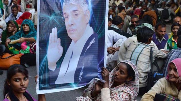 Devotees of self-styled godman Rampal Maharaj. (AFP File Photo) Devotees of self-styled godman Rampal Maharaj. (AFP File Photo)