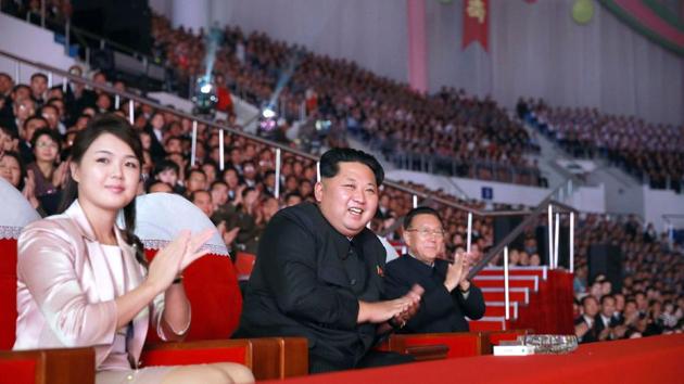 (FILES) This undated file picture released by North Korea's official Korean Central News Agency (KCNA) on October 19, 2015 shows North Korean leader Kim Jong-Un (C), accompanied by his wife Ri Sol-Ju (L) in Pyongyang. (AFP) (FILES) This undated file picture released by North Korea's official Korean Central News Agency (KCNA) on October 19, 2015 shows North Korean leader Kim Jong-Un (C), accompanied by his wife Ri Sol-Ju (L) in Pyongyang. (AFP)