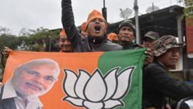 BJP supporters celebrate assembly elections results in Imphal, Manipur, where the BJP weaned away six MLAs from the ruling Congress ahead of polls. (AFP file) BJP supporters celebrate assembly elections results in Imphal, Manipur, where the BJP weaned away six MLAs from the ruling Congress ahead of polls. (AFP file)