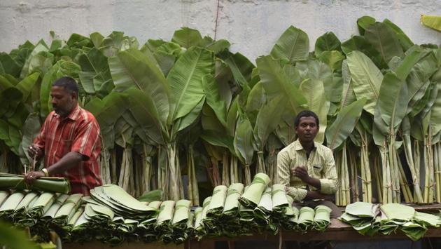 Every day farmers and traders throng to the market, a journey that is often arduous with farmers having to travel late night with their harvest to reach for their stalls in time. The markets open at 2 a.m and business wraps up before noon. (Arijit Sen/HT Photo) 