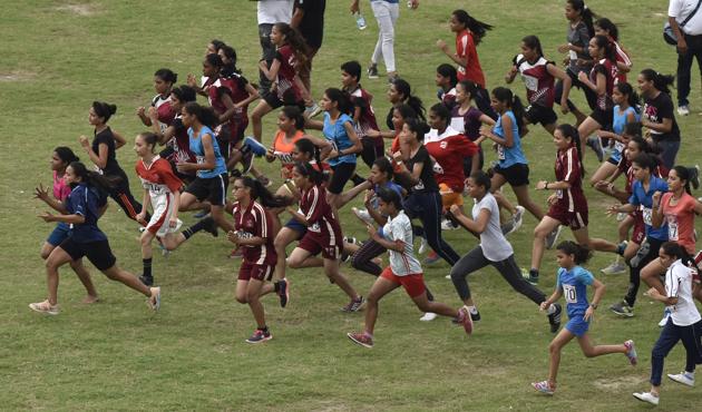 Hundreds of Noida students participated in the cross country race at Noida stadium on Tuesday. (Virendra Singh Gosain/HT PHOTO) Hundreds of Noida students participated in the cross country race at Noida stadium on Tuesday. (Virendra Singh Gosain/HT PHOTO)