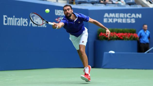 Marin Cilic of Croatia in action during his first round Men's Singles match against Tennys Sandgren of the United States. (AFP)