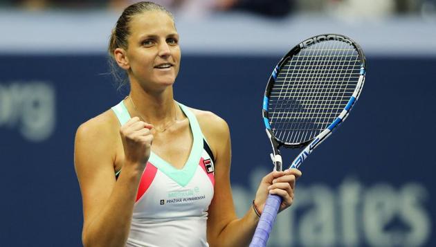 Karolina Pliskova of the Czech Republic reacts after defeating Magda Linette of Poland in their first round Women's Singles match. (AFP)