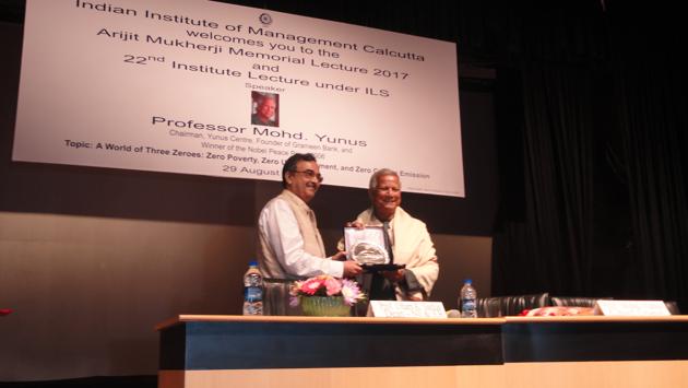IIM Calcutta director Prof Saibal Chattopadhyay (left) felicitating Prof Mohd Yunus, who delivered the Arijit Mukherji Memorial Lecture at the institute IIM Calcutta director Prof Saibal Chattopadhyay (left) felicitating Prof Mohd Yunus, who delivered the Arijit Mukherji Memorial Lecture at the institute