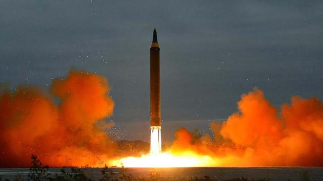 This picture from North Korea's official Korean Central News Agency (KCNA) taken on August 29, 2017 and released on August 30, 2017 shows North Korea's intermediate-range strategic ballistic rocket Hwasong-12 lifting off from the launching pad at an undisclosed location near Pyongyang. (AFP Photo)