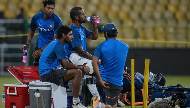 The likes of Dhawan, Bhuvneshwar Kumar take a break from their intense practice session. (AFP)