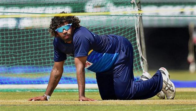 Sri Lankan captain Lasith Malinga inspects the pitch during a practice session in Colombo on Wednesday.(PTI)