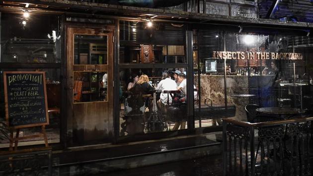 Ratta Bussakornnun, a 27-year-old who works in the cosmetics industry admitted that she was initially sceptical. Many wealthier Thais, she said, think of insects as ‘unappetising and dirty.’ But by the end of her meal she was won over. ‘I just ate scallops topped with bamboo worms and a fish fillet with an ant egg sauce. It was delicious,’ she beamed, a gentle jazz track playing overhead in the dimly lit restaurant. (Lillian Suwanrumpha / AFP) 