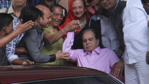Recently, Dilip Kumar was admitted in Lilavati hospital. This photo was taken when he was discharged from there. Recently, Dilip Kumar was admitted in Lilavati hospital. This photo was taken when he was discharged from there.