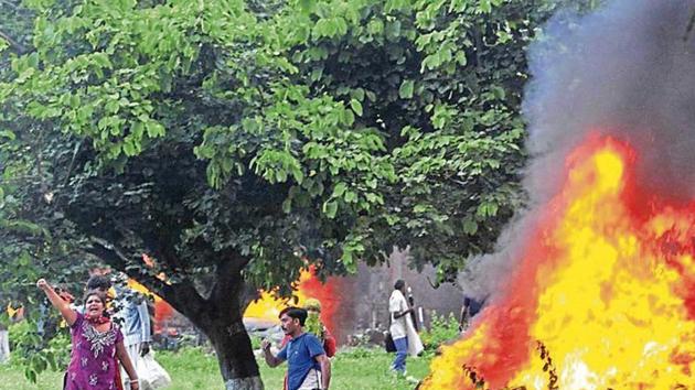 The ‘premis’ — as the dera followers like to call themselves — had clashed with security forces and indulged in rioting and arson soon after their sect chief Gurmeet Ram Rahim was convicted in a rape case on Friday afternoon. (HT Photo) The ‘premis’ — as the dera followers like to call themselves — had clashed with security forces and indulged in rioting and arson soon after their sect chief Gurmeet Ram Rahim was convicted in a rape case on Friday afternoon. (HT Photo)