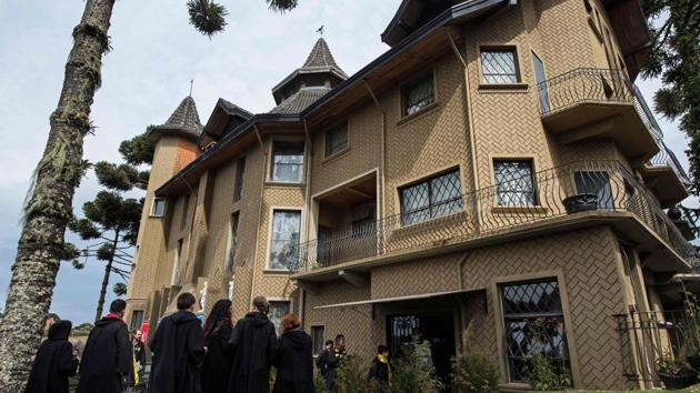 Students of the School of Magic and Witchcraft gather outside a castle in the mountain city of Campos do Jordao, some 180 km from Sao Paulo, Brazil on August 20.(AFP Photo)