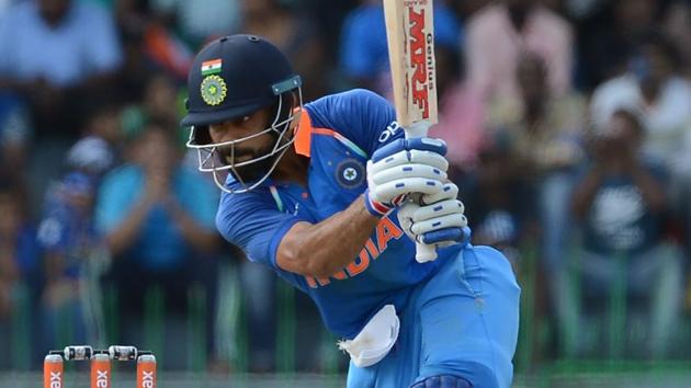 Kohli showed his belligerent mood early, hammering left-arm paceman Vishwa Fernando for three fours in a row, dispatching each pitched-up delivery. (AFP)