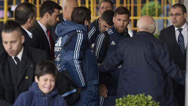 Argentine football star Lionel Messi looks at a boy who is pulled away by security staff. Messi later met with the youngster as Argentina's football team arrived at a hotel in Montevideo on August 30, 2017. Argentina will face Uruguay for the FIFA World Cup qualifiers on August 31. (AFP) Argentine football star Lionel Messi looks at a boy who is pulled away by security staff. Messi later met with the youngster as Argentina's football team arrived at a hotel in Montevideo on August 30, 2017. Argentina will face Uruguay for the FIFA World Cup qualifiers on August 31. (AFP)