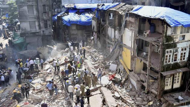 Rescue work in progress after a five storey building collapsed in Bhendi bazaar in Mumbai on Thursday.(PTI Photo)