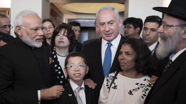Prime Minister Narendra Modi and Israeli Prime Minister Benjamin Netanyahu meet with Moshe Holtzberg (C), son of slain US Rabbi Gavriel Holtzberg who was killed with his wife in the November 26, 2008 attacks on the Nariman Chabad house in Mumbai, on July 5, 2017. The young Moshe was rescued in 2008 by his nanny following the attacks. (AFP File Photo) Prime Minister Narendra Modi and Israeli Prime Minister Benjamin Netanyahu meet with Moshe Holtzberg (C), son of slain US Rabbi Gavriel Holtzberg who was killed with his wife in the November 26, 2008 attacks on the Nariman Chabad house in Mumbai, on July 5, 2017. The young Moshe was rescued in 2008 by his nanny following the attacks. (AFP File Photo)