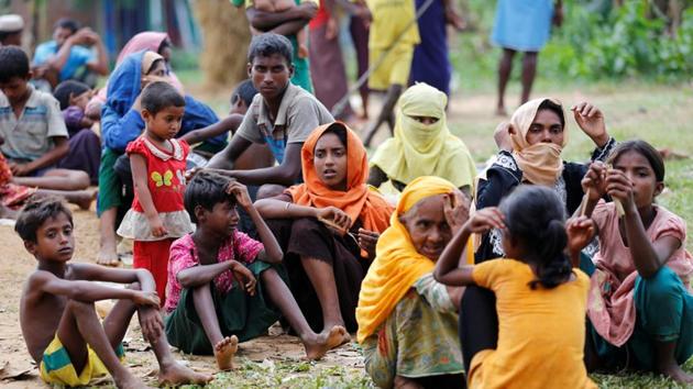 New Rohingya refugees wait to enter the Kutupalang makeshift refugee camp, in Cox’s Bazar, Bangladesh. (Reuters Photo) New Rohingya refugees wait to enter the Kutupalang makeshift refugee camp, in Cox’s Bazar, Bangladesh. (Reuters Photo)