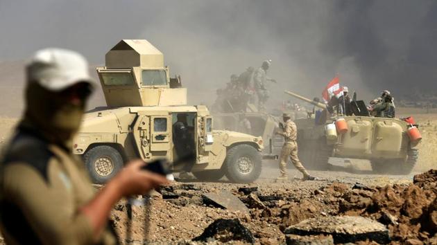 Members of Iraqi army are seen during the war between Iraqi army and Shi'ite Popular Mobilization Forces (PMF) against the Islamic State militants in al-Ayadiya, northwest of Tal Afar, Iraq August 28, 2017. (Reuters Photo) Members of Iraqi army are seen during the war between Iraqi army and Shi'ite Popular Mobilization Forces (PMF) against the Islamic State militants in al-Ayadiya, northwest of Tal Afar, Iraq August 28, 2017. (Reuters Photo)