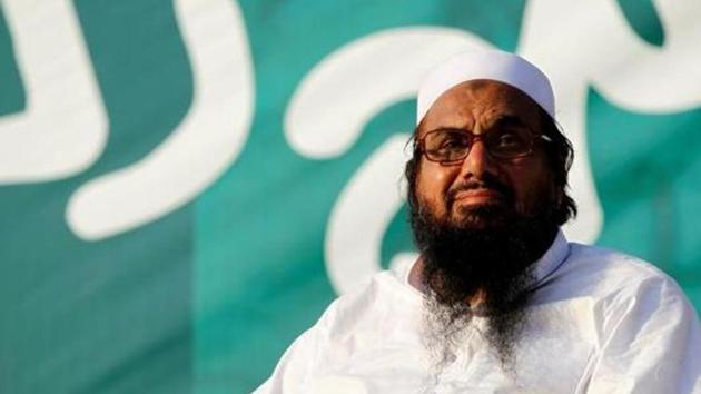 Hafiz Muhammad Saeed, chief of the banned Islamic charity Jamat-ud-Dawa, looks over the crowed as they end a "Kashmir Caravan" from Lahore with a protest in Islamabad, Pakistan July 20, 2016. (Reuters File photo) Hafiz Muhammad Saeed, chief of the banned Islamic charity Jamat-ud-Dawa, looks over the crowed as they end a "Kashmir Caravan" from Lahore with a protest in Islamabad, Pakistan July 20, 2016. (Reuters File photo)
