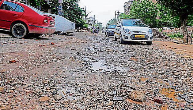 The PWD, which is responsible for maintaining over 1,200 km of roads in the city, has been asked to do away with manual repairing as it makes the ride rough. (Representative photo) The PWD, which is responsible for maintaining over 1,200 km of roads in the city, has been asked to do away with manual repairing as it makes the ride rough. (Representative photo)
