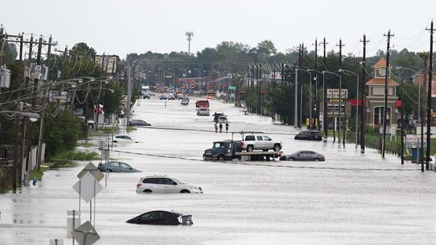 A flooded street in Houston , Texas. Monster storm Harvey made landfall again Wednesday in Louisiana, evoking painful memories of Hurricane Katrina's deadly strike 12 years ago, as time was running out in Texas to find survivors in the raging floodwaters. (AFP photo) A flooded street in Houston , Texas. Monster storm Harvey made landfall again Wednesday in Louisiana, evoking painful memories of Hurricane Katrina's deadly strike 12 years ago, as time was running out in Texas to find survivors in the raging floodwaters. (AFP photo)