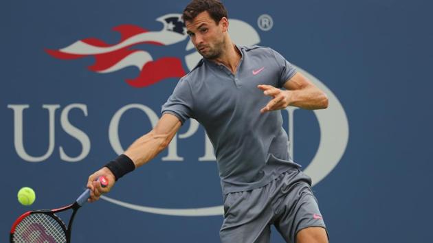 Grigor Dimitrov of Bulgaria returns a shot against Andrey Rublev of Russia during their second round US Open match. (AFP) Grigor Dimitrov of Bulgaria returns a shot against Andrey Rublev of Russia during their second round US Open match. (AFP)