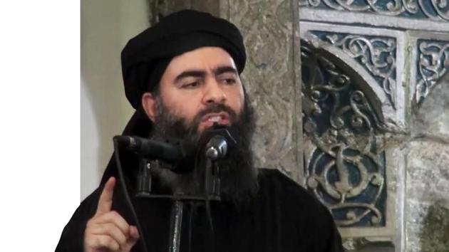 FILE - This file image made from video posted on a militant website Saturday, July 5, 2014, purports to show the leader of the Islamic State group, Abu Bakr al-Baghdadi, delivering a sermon at a mosque in Iraq during his first public appearance. (AP) FILE - This file image made from video posted on a militant website Saturday, July 5, 2014, purports to show the leader of the Islamic State group, Abu Bakr al-Baghdadi, delivering a sermon at a mosque in Iraq during his first public appearance. (AP)