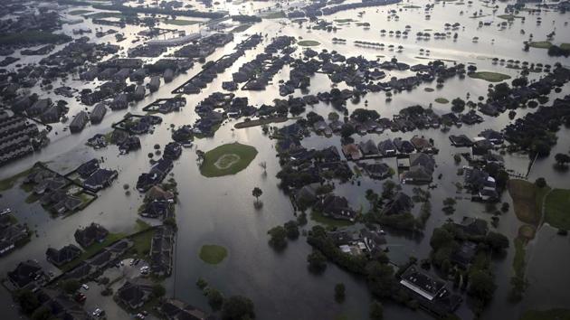 According to FEMA officials, about 325,000 people have already sought federal emergency aid in the wake of Harvey with more than $57 million in individual assistance  already been paid out.  (Gerald Herbert / AP) 