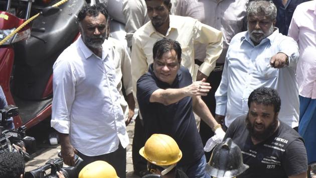 Iqbal Kaskar at the collapse site on Thursday.(Anshuman Poyrekar/HT Photo)