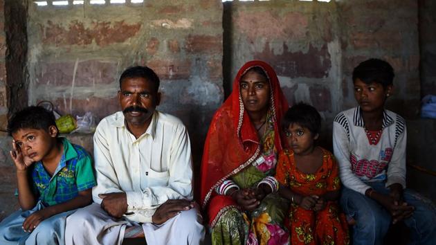 This photo taken on June 16, 2017 shows a family of Pakistani Hindus living in an unauthorised settlement in Jodhpur in India's western state of Rajasthan.(AFP)