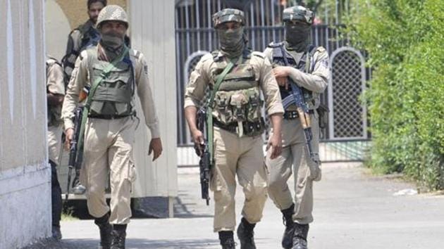 Paramilatary soldiers patrol outside the residence of prominent business man as NIA conducts raid on the premises in Sanat Nagar Srinagar. (HT File Photo) Paramilatary soldiers patrol outside the residence of prominent business man as NIA conducts raid on the premises in Sanat Nagar Srinagar. (HT File Photo)