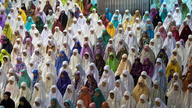 People attend prayers on Eid al- Adha at Istiqlal Mosque in Jakarta, Indonesia. Muslims around the world are celebrating Eid al-Adha holiday on Friday as some 2 million Muslim pilgrims carry out the final rites of the annual Hajj in Saudi Arabia.The final days of Hajj coincide with the Eid al-Adha holiday or ‘Feast of Sacrifice,’ to commemorate Abraham’s test of faith. For the holiday, devotees sacrifice livestock and distribute the meat to the poor. (REUTERS)
