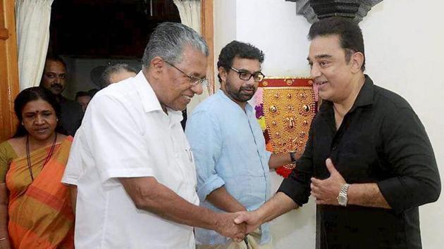 Actor Kamal Haasan being welcomed by Kerala chief minister Pinarayi Vijayan at his official residence in Thiruvananthapuram on Friday.(PTI Photo)