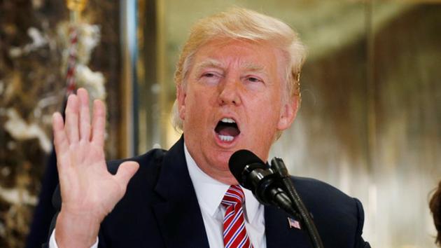 US President Donald Trump speaks about the violence, injuries and deaths at the "Unite the Right" rally in Charlottesville as he talks to the media in the lobby of Trump Tower in Manhattan, New York, US, August 15, 2017. (REUTERS) US President Donald Trump speaks about the violence, injuries and deaths at the "Unite the Right" rally in Charlottesville as he talks to the media in the lobby of Trump Tower in Manhattan, New York, US, August 15, 2017. (REUTERS)