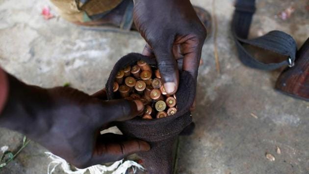 Before the South Sudanese rebels attacked the town of Kaya, they handed out supplies - a ragged strip of red cloth to identify themselves to each other as friendly forces, a packet of biscuits, and two precious magazines of ammunition per fighter.But government forces counter-attacked, killing several rebels and an American journalist. The rebels ran out of ammunition after 40 minutes and had to retreat back to their base in the bush. (Goran Tomasevic / REUTERS) Before the South Sudanese rebels attacked the town of Kaya, they handed out supplies - a ragged strip of red cloth to identify themselves to each other as friendly forces, a packet of biscuits, and two precious magazines of ammunition per fighter.But government forces counter-attacked, killing several rebels and an American journalist. The rebels ran out of ammunition after 40 minutes and had to retreat back to their base in the bush. (Goran Tomasevic / REUTERS)
