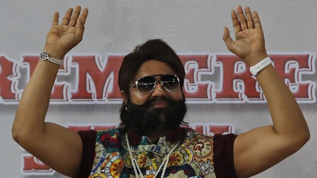 Gurmeet Singh Ram Rahim Insan, gestures during the premiere of the "Jattu Engineer" movie in New Delhi, India on May 17, 2017. (AP File Photo) Gurmeet Singh Ram Rahim Insan, gestures during the premiere of the "Jattu Engineer" movie in New Delhi, India on May 17, 2017. (AP File Photo)