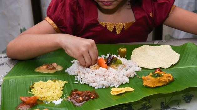 Sadhya is a vegetarian feast traditionally served on a banana leaf.(Shutterstock)