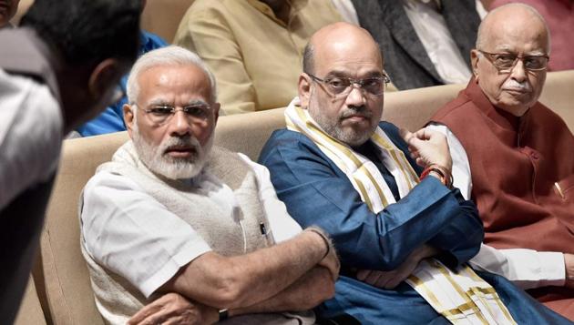 Prime Minister Narendra Modi, BJP President Amit Shah and senior leader LK Advani during a meeting of the BJP parliamentary party in New Delhi on Thursday. (PTI) Prime Minister Narendra Modi, BJP President Amit Shah and senior leader LK Advani during a meeting of the BJP parliamentary party in New Delhi on Thursday. (PTI)
