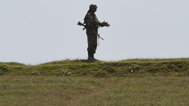 A paramilitary trooper stands guard on a national highway in Srinagar. Sikh radical elements sheltered in Pakistan are engaged in anti-India activities such as providing financial support to terror activities. (AFP File Photo) A paramilitary trooper stands guard on a national highway in Srinagar. Sikh radical elements sheltered in Pakistan are engaged in anti-India activities such as providing financial support to terror activities. (AFP File Photo)