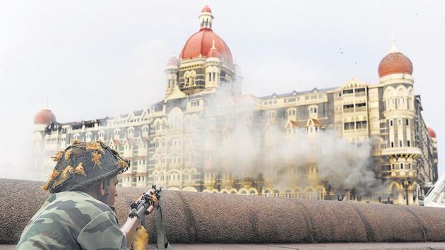 The Taj Mahal Hotel in Mumbai on November 29, 2008 during the terrorist attacks. ((PEDRO UGARTE/AFP)) The Taj Mahal Hotel in Mumbai on November 29, 2008 during the terrorist attacks. ((PEDRO UGARTE/AFP))