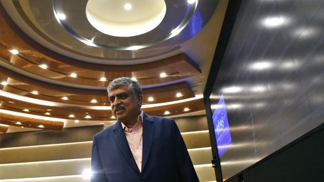 Newly appointed Infosys chairman Nandan Nilekani arrives for a press conference at the company's headquarters in Bangalore on August 25, 2017. (AP Photo) Newly appointed Infosys chairman Nandan Nilekani arrives for a press conference at the company's headquarters in Bangalore on August 25, 2017. (AP Photo)