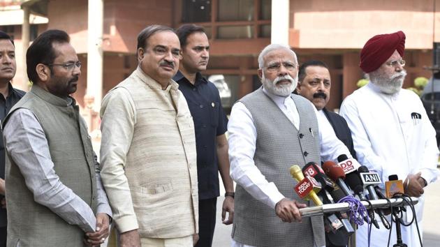 Prime Minister Narendra Modi with some of his cabinet colleagues. Modi will reshuffle the council of ministers on Sunday.(Mohd Zakir/HT PHOTO)