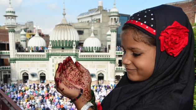 A little girl offering namaz on Eid in Amritsar.