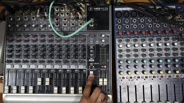 The broadcasting room has mikes, mixer consoles, computers, amplifier, transmitter, etc. On the wall, there is hand-written programme chart and a few inspiring messages by the staff. (Raj K Raj/HT PHOTO) The broadcasting room has mikes, mixer consoles, computers, amplifier, transmitter, etc. On the wall, there is hand-written programme chart and a few inspiring messages by the staff. (Raj K Raj/HT PHOTO)
