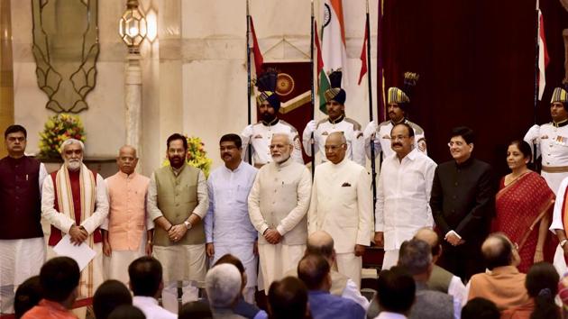 President Ram Nath Kovind, vice president M Venkaiah Naidu and Prime Minister Narendra Modi pose with some of the new members of the Union cabinet after a reshuffle exercise, at the Rashtrapati Bhavan in New Delhi on Sunday.(PTI)