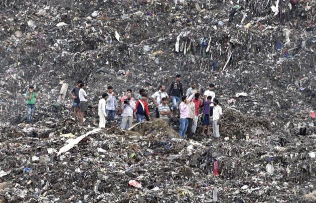 This 70 acre garbage dump is situated in the middle of a densely populated part of the city and has been a disaster waiting to happen for a few years now. That the allowed height It is estimated that anywhere about 3000 metric tonnes of garbage are dumped at the Ghazipur site every single day; in spite of the fact that this landfill was supposed to have shut down in 2002, when it was filled to capacity.(Mohd Zakir / Hindustan Times)
