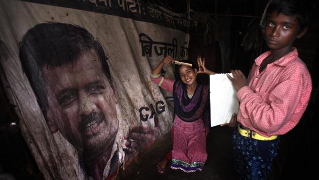 Meenu, 18, was a ragpicker at Ghazipur landfill site. Most of the items at her house came from the landfill. She uses an old AAP hoarding as a partition in her house in a slum cluster in east Delhi’s Ghazipur. (Sonu Mehta/HT Photo) Meenu, 18, was a ragpicker at Ghazipur landfill site. Most of the items at her house came from the landfill. She uses an old AAP hoarding as a partition in her house in a slum cluster in east Delhi’s Ghazipur. (Sonu Mehta/HT Photo)