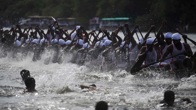 Indian oarsmen row a serpentine boat as they compete in the Mahatma boat race along the Pamba river ahead of Onam celebrations in Chengannur, near the Allepey district of the southern Kerala state. (ARUN SANKAR / AFP) Indian oarsmen row a serpentine boat as they compete in the Mahatma boat race along the Pamba river ahead of Onam celebrations in Chengannur, near the Allepey district of the southern Kerala state. (ARUN SANKAR / AFP)