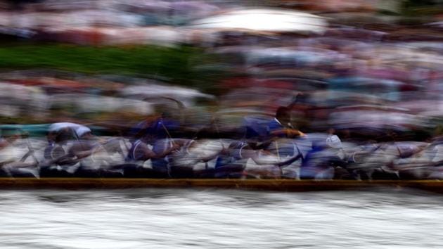 Indian oarsmen row a serpentine boat as they compete in the Mahatma boat race along the Pamba river ahead of Onam celebrations in Chengannur, near the Allepey district of the southern Kerala state. (ARUN SANKAR / AFP) Indian oarsmen row a serpentine boat as they compete in the Mahatma boat race along the Pamba river ahead of Onam celebrations in Chengannur, near the Allepey district of the southern Kerala state. (ARUN SANKAR / AFP)
