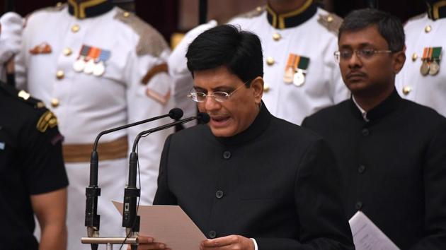 Bharatiya Janata Party leader and member of parliament Piyush Goyal takes oath during the swearing-in ceremony of new ministers at the Presidential Palace in New Delhi on Sunday.