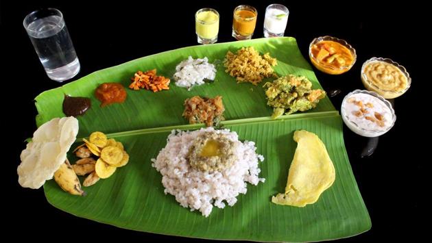 The most impressive part of Onam celebration is the grand feast called Onasadya, prepared on Thiruonam. It is a nine course meal consisting of 11 to 13 essential dishes. Onasadya is served on banana leaves and people sit on a mat laid on the floor to have the meal. The most impressive part of Onam celebration is the grand feast called Onasadya, prepared on Thiruonam. It is a nine course meal consisting of 11 to 13 essential dishes. Onasadya is served on banana leaves and people sit on a mat laid on the floor to have the meal.